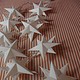 Eine Sternenlichterkette mit 3-D-Sternen