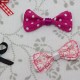 Kleine Schleifchen aus Stoff und Satinband