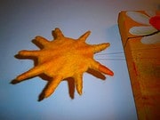 Filzen einer kleinen Sonne