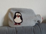 Wärmflaschenhülle mit Pinguinapplikation