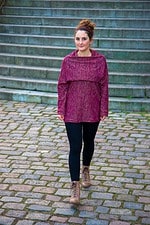 Twister als kunterbuntes, glitzerndes Strickkleid