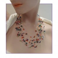 Ein- oder mehrreihiges Collier mit 'schwebenden' Perlen - Knotentechnik 