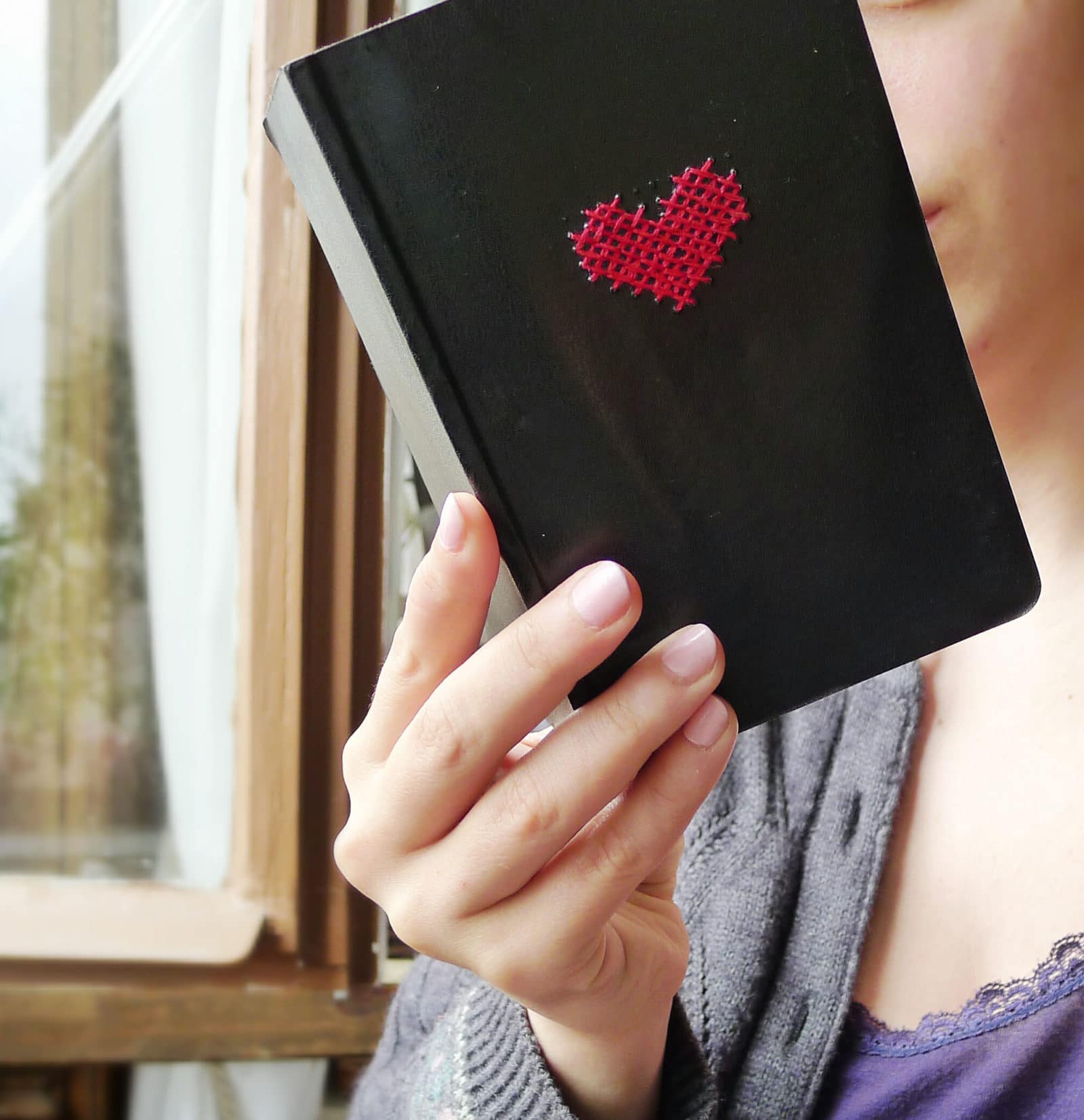 Besticke ein Notizbuch