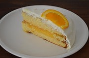 Lemon Curd-Kuchen im Zitrusfruchtkleid