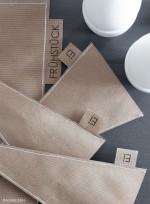 Eierhütchen und Tischsets aus Packpapier genäht