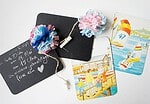 Einladungskarten aus Tafelfolie und recycelten Kinderbüchern