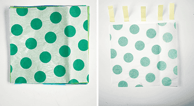 Selbstgemachte Wabenbälle und Pompoms aus Papier in verschiedenen Größen und Mustern, ideal für DIY Dekorationen und kreative Bastelprojekte.