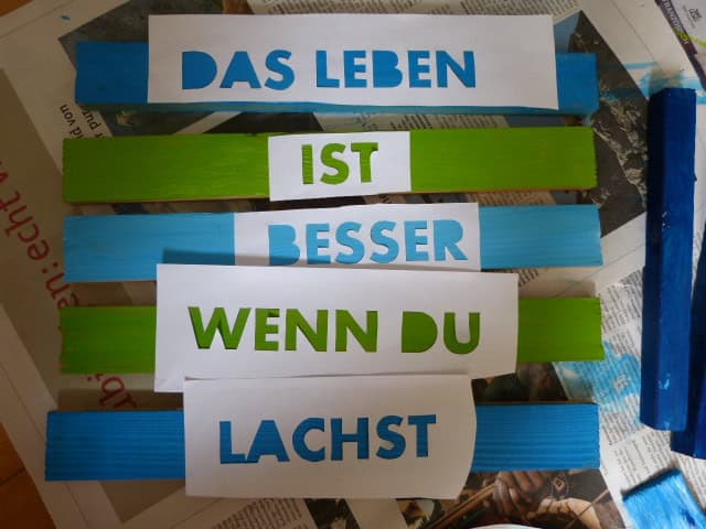 Schild oder Topfuntersetzer aus Holz mit Spruch