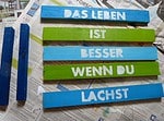 Schild oder Topfuntersetzer aus Holz mit Spruch
