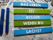 Schild oder Topfuntersetzer aus Holz mit Spruch