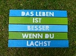 Schild oder Topfuntersetzer aus Holz mit Spruch