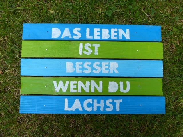 Schild oder Topfuntersetzer aus Holz mit Spruch