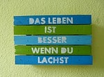 Schild oder Topfuntersetzer aus Holz mit Spruch