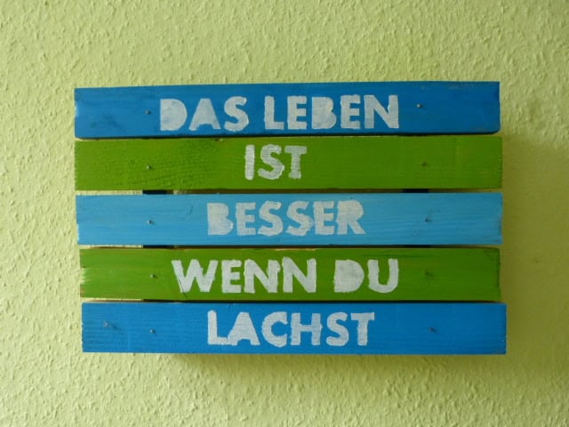 Schild oder Topfuntersetzer aus Holz mit Spruch