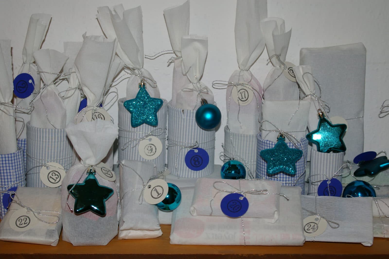 Upcycling Adventskalender aus Dosen und Klopapierrollen