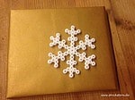 Weihnachtsgeschenke verzieren mit Bügelperlen
