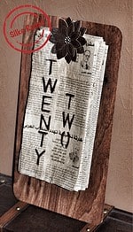 Kalender aus beschichtetem, vergilbtem Zeitungspapier