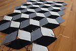 Geometrische Häkeldecke mit 3D-Effekt