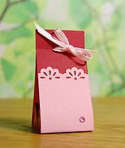 Kleine Praline als Gastgeschenk