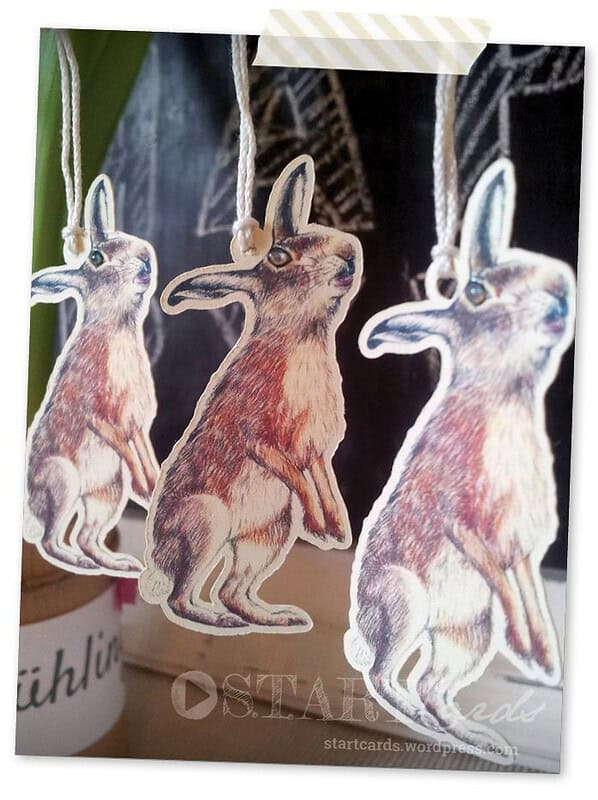 Handgemachte Osterhasen Anhänger aus Papier, ideal für Osterdekorationen, mit detailreichen Designs und natürlichen Farben, perfekt für festliche Osterstimmung.