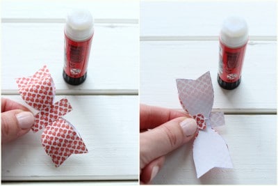Papierblumen aus bedrucktem Papier, ideal für Osterzweige oder Dekorationen, mit Klebstoff zum Basteln von Blumen oder Schleifen.