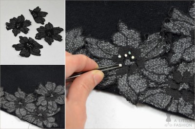 Schwarze Spitze mit Blumenmuster wird per Hand auf Stoff genäht, um eine Strickjacke zu verschönern, passend zum Thema HANDMADE Kultur.