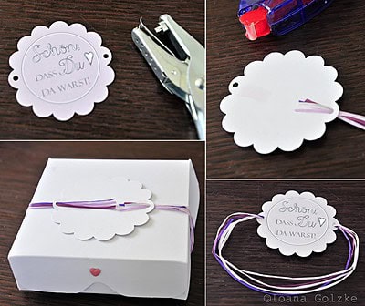 Handgemachte Geschenkbox mit Schleife, Herz und Grußkarte für besondere Anlässe, perfekt für kreative Geschenkverpackungen und liebevolle Überraschungen.