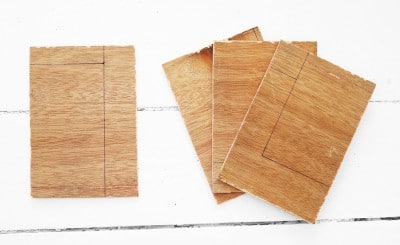 Mehrere Holzplatten unterschiedlicher Größen und Formen für kreative Handwerksarbeiten, passend zum Thema 'Die hängende Galerie'.