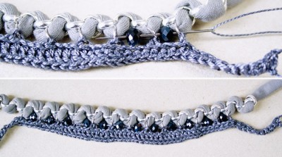 Handgefertigte gehäkelte Statement-Kette mit Perlen und Fäden, ideal für modische Akzente und kreative Accessoires.