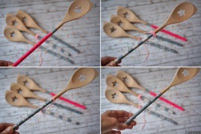 Selbstgemachte Holzlöffel mit dekorativer bemalter Stange, ideal für kreative Handwerksprojekte und nachhaltige Küchenutensilien.