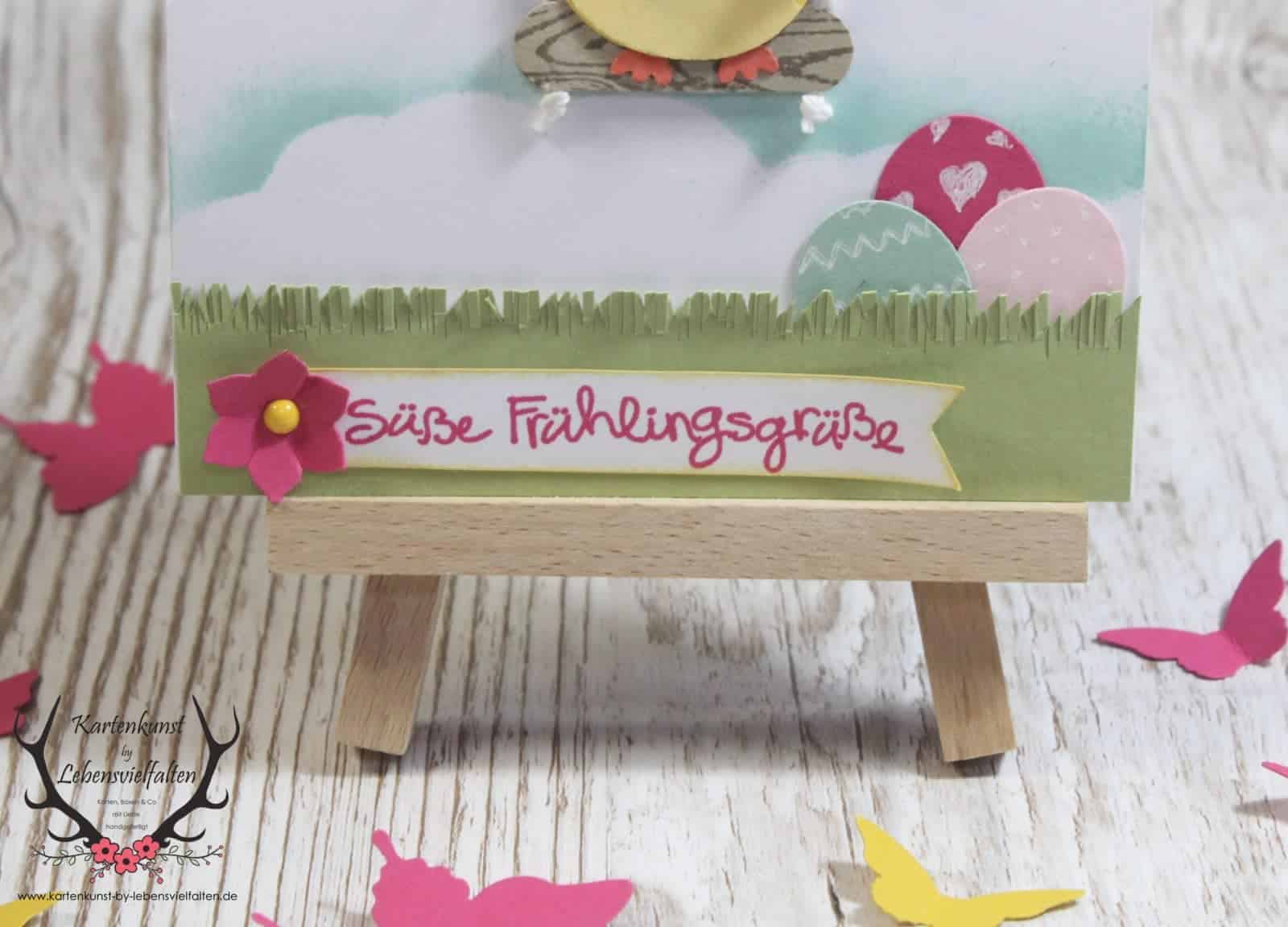 Osterkarte mit Küken auf der Schaukel und Frühlingsgruß