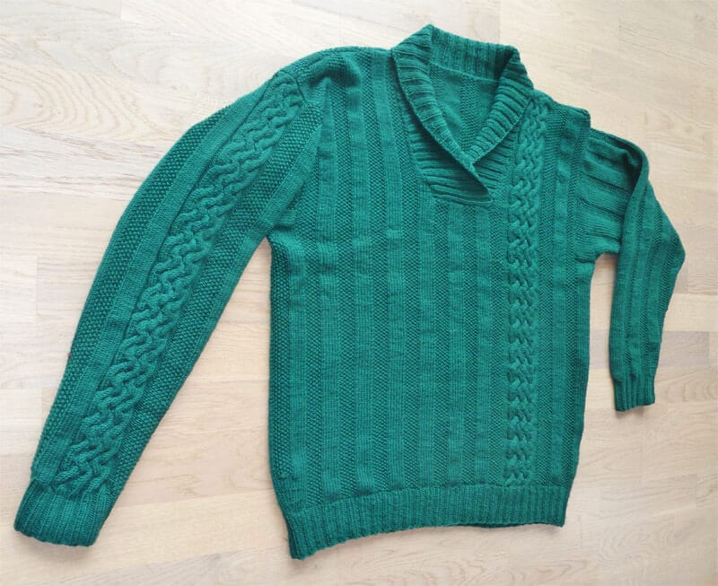 Männerpullover mit Zopf