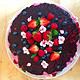 Creme Torte mit frischen Beeren