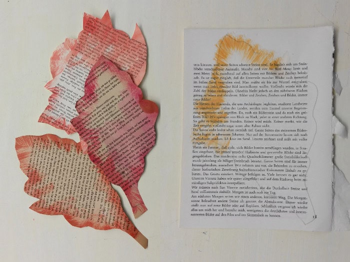 Eine Herbstgirlande für Buchliebhaber aus Buchseiten basteln.