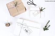 Etiketten auf Geschenkpapier malen