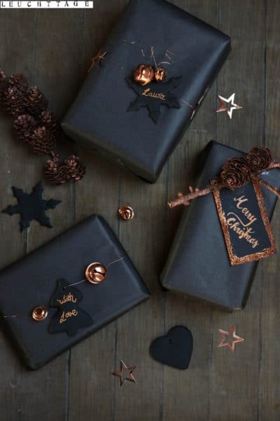 Geschenke einpacken in schwarz und kupfer