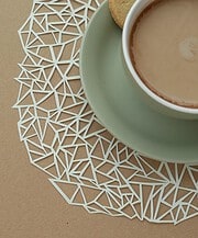 Papercuts: Geometrische Papierdeckchen