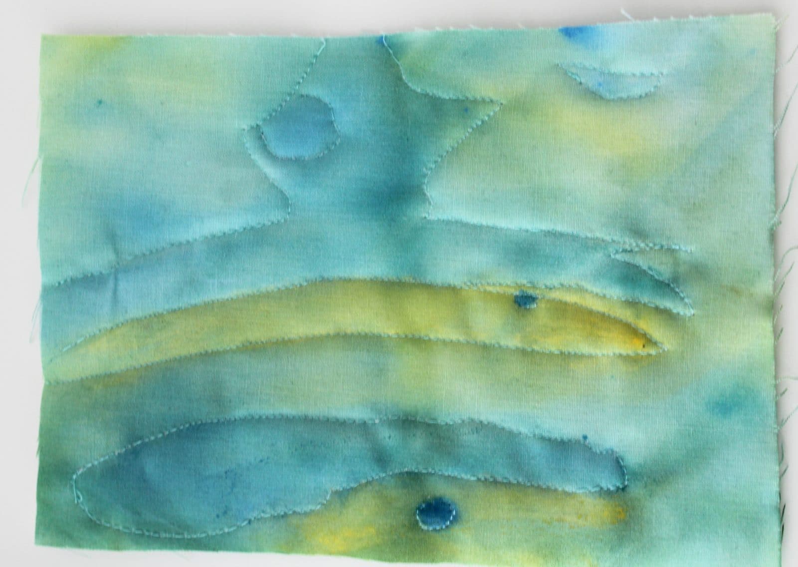 Ein Bild aus Wasserfarbe und Stoff