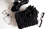 Boho-Häkel-Clutch in schwarz-weiß