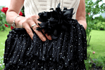 Boho-Häkel-Clutch in schwarz-weiß