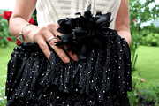 Boho-Häkel-Clutch in schwarz-weiß