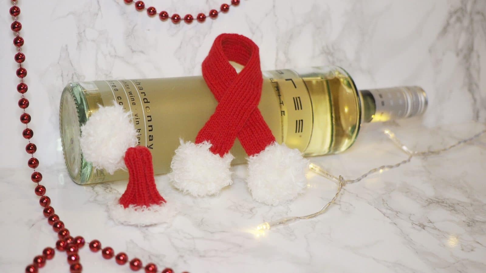 Last-Minute-Geschenkidee – Gestrickte Weinverpackung