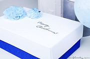 Geschenkverpackung mit Taschentuch-Bommeln