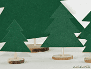 Weihnachtliche Tischdeko mit Holzscheiben