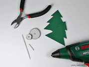 Weihnachtliche Tischdeko mit Holzscheiben