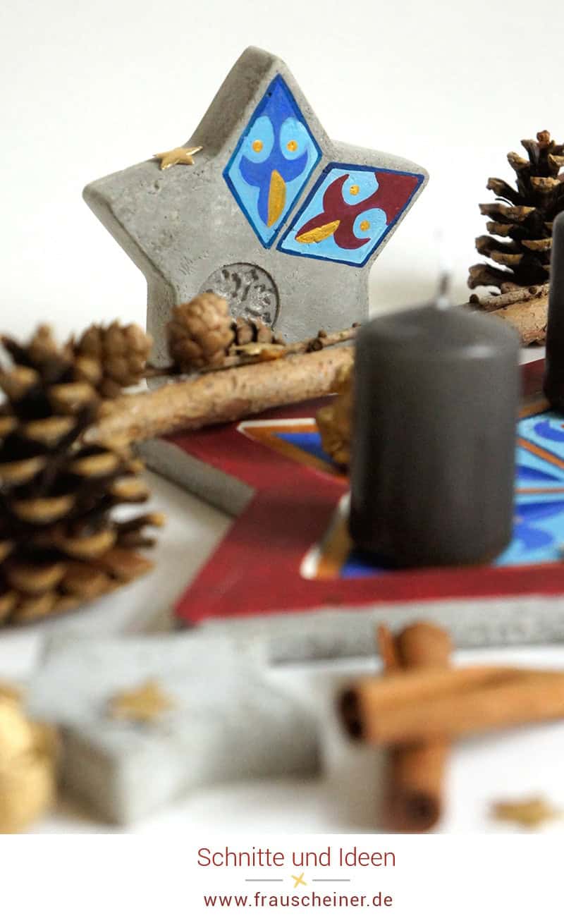 Adventskranz aus Beton mit Ornamentmalerei