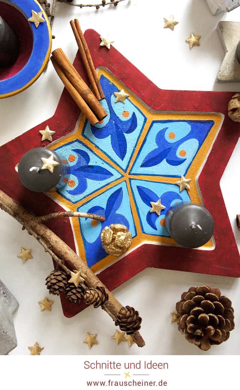 Adventskranz aus Beton mit Ornamentmalerei