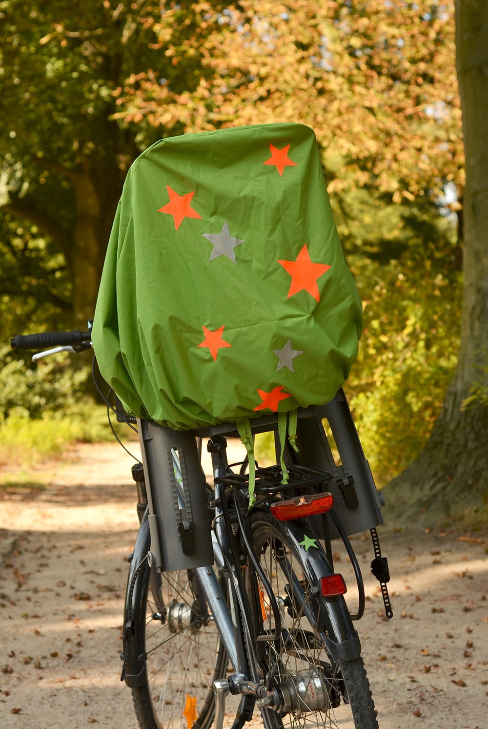 Nähanleitung: Regenschutz für den Fahrrad-Kindersitz