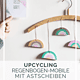 DIY-Upcycling-Idee: Regenbogen-Mobile mit Kleiderbügel und Astscheiben