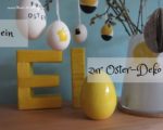 Oster-Deko: Pappbuchstaben mit Wolle umwickeln